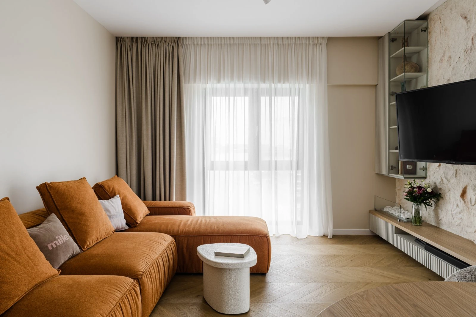 Cognac Milano in an apartment with afternoon light filtering through sheer curtains