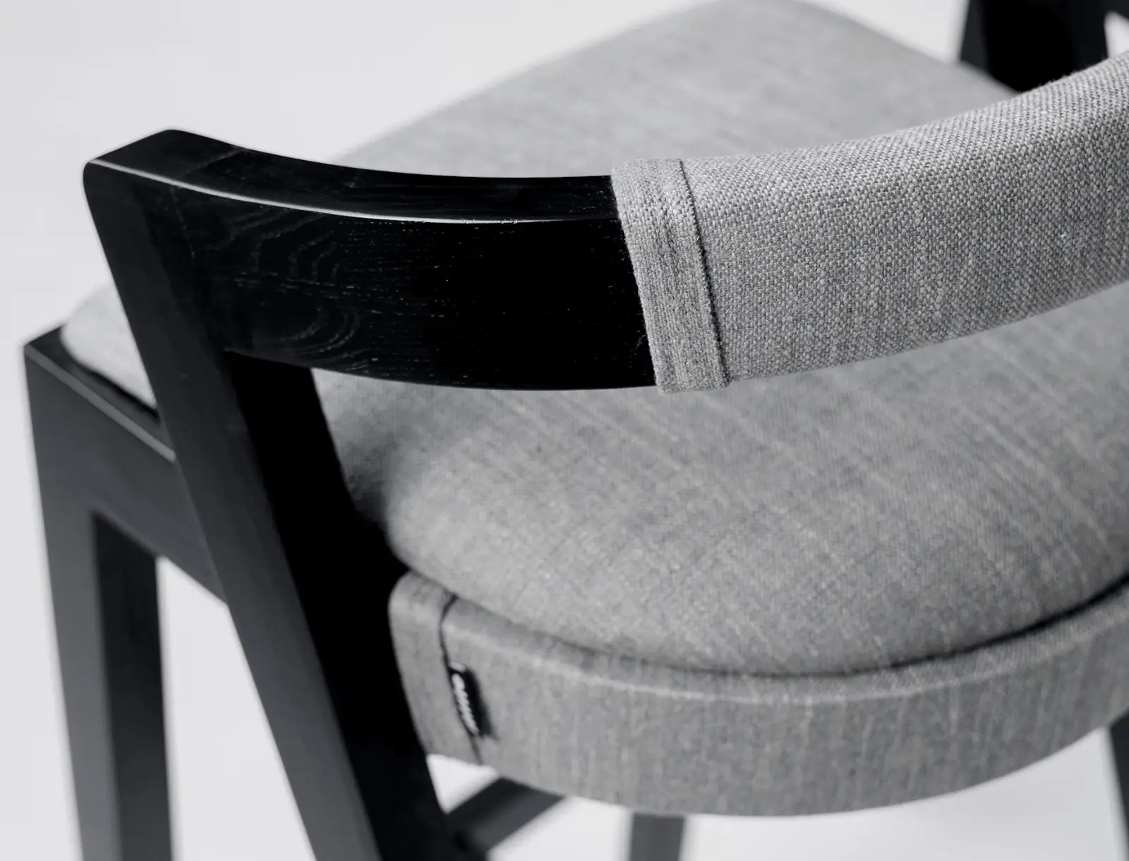 Close detail of the Baffi round upholstered seat in the studio
